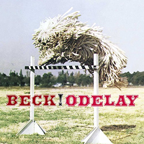 Album cover for Beck’s “Odelay” featuring a mop jumping a hurdle.