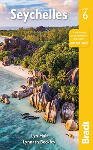 Seychelles travel guide cover with beach, rocks, and lush greenery.