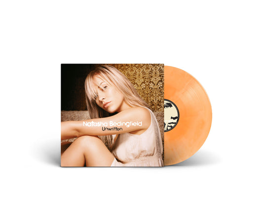 Natasha Bedingfield Unwritten album cover with a peach-colored vinyl record.