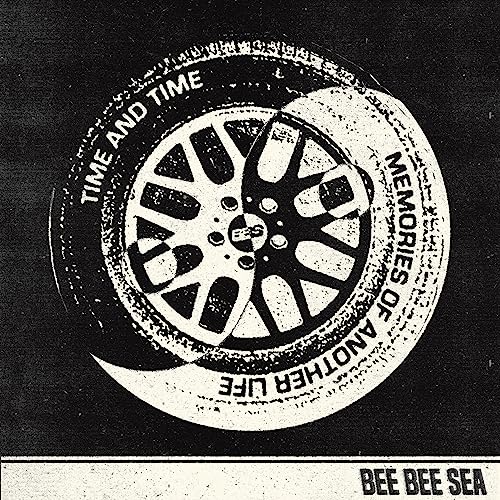 Black and white vinyl record cover depicting a car tire with text.