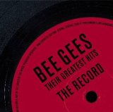 Close-up of a red vinyl record label with Bee Gees text in black.