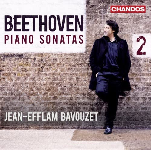 CD cover featuring pianist Jean-Efflam Bavouzet leaning against a brick wall.