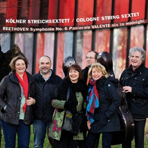 CD cover featuring a string sextet posing in front of red abstract shapes.
