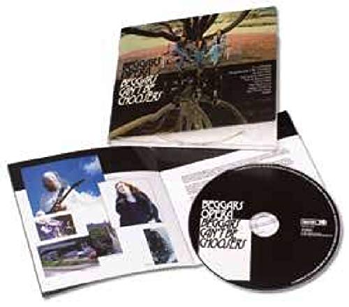 CD case open, showing album art and inner booklet with musicians.