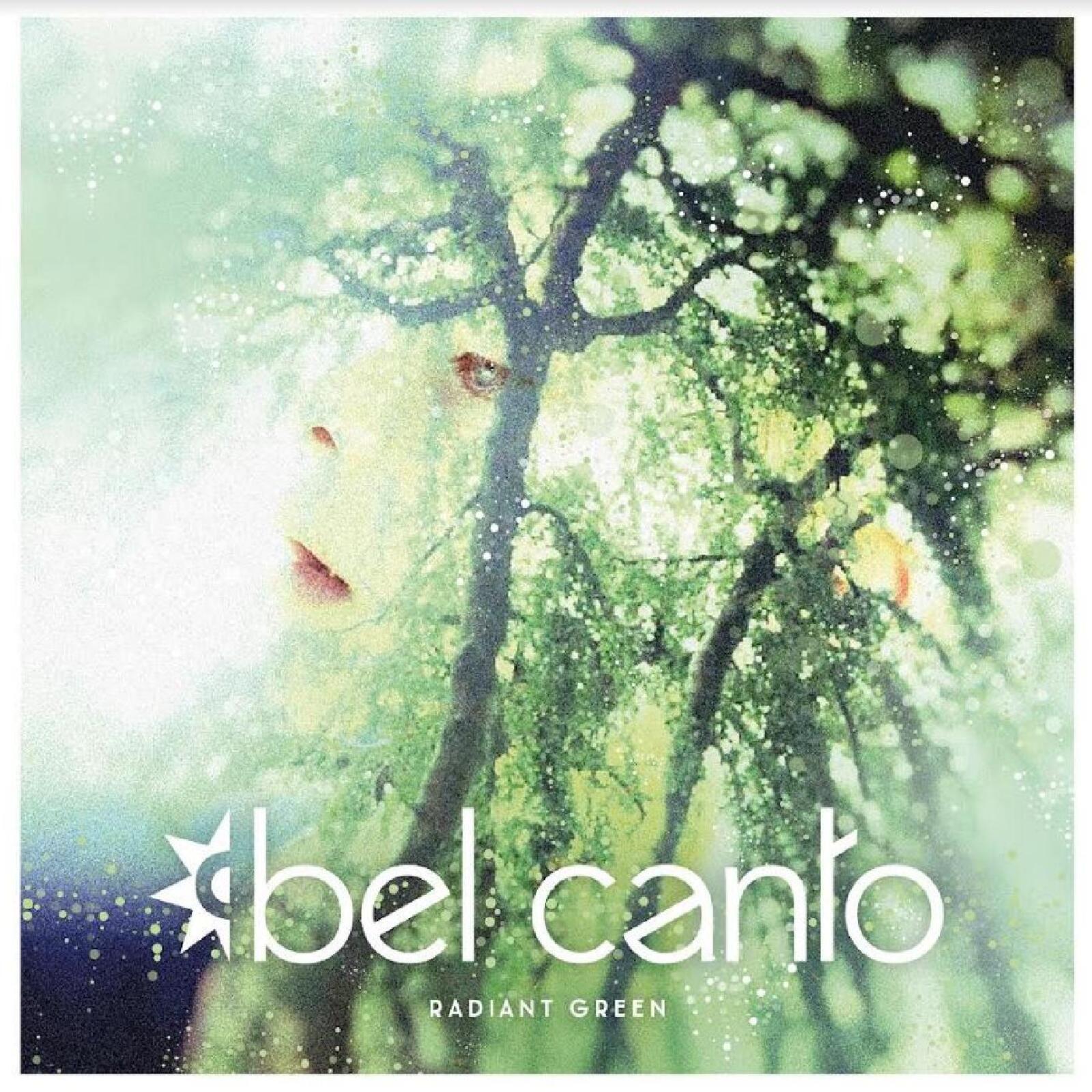 Vinyl record cover with a blurred woman’s face and green foliage.