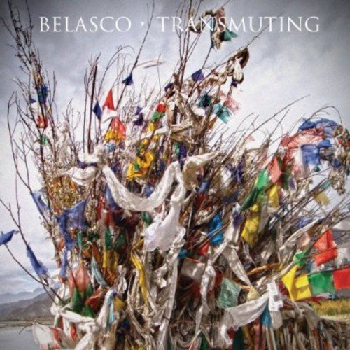 Album cover with colorful prayer flags tied to sticks against a cloudy sky.