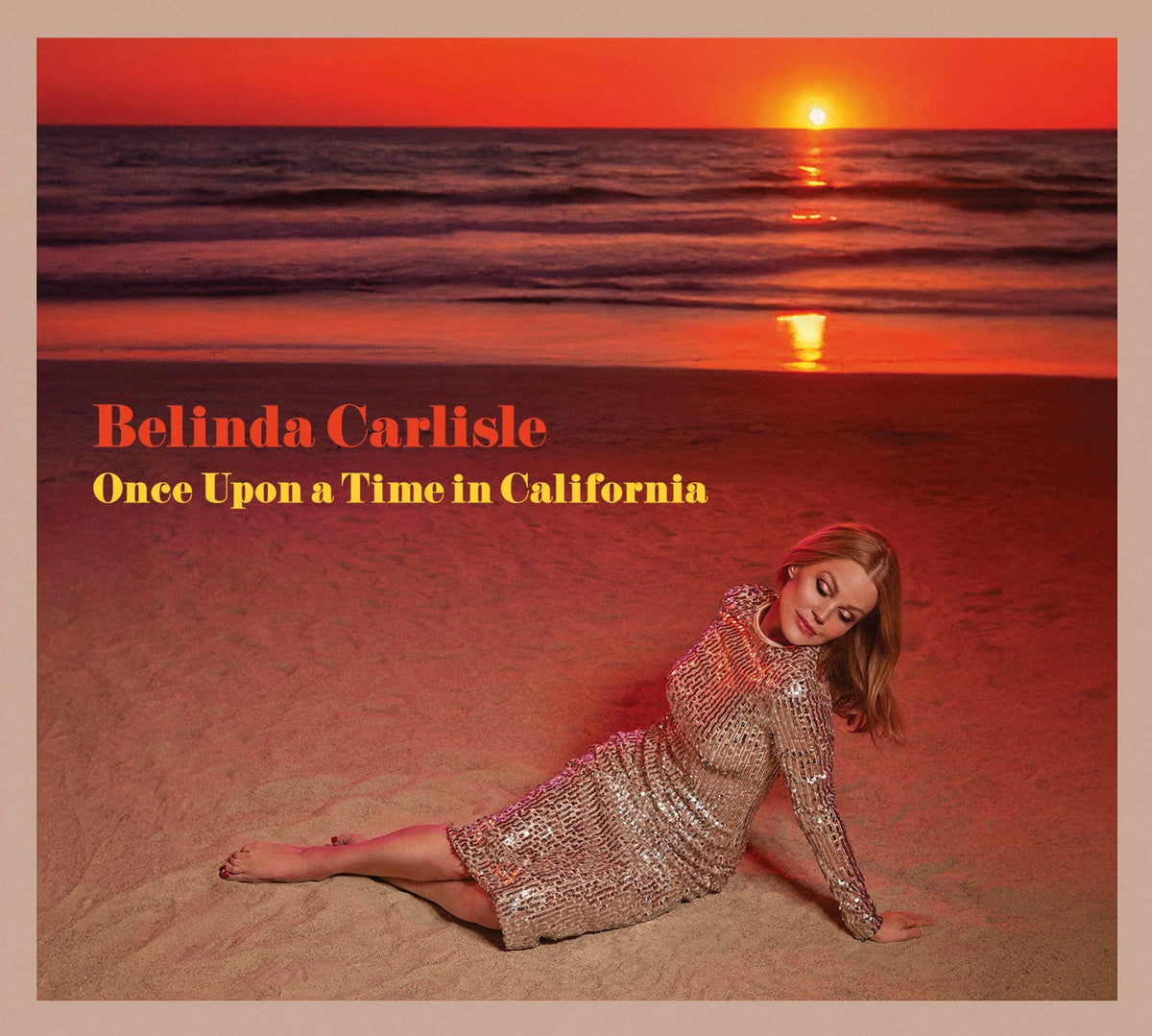 Belinda Carlisle album cover: beach scene with artist portrait.