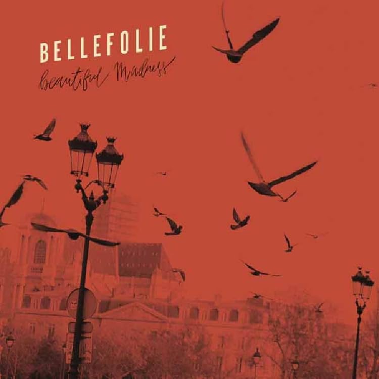 CD cover: red sky with birds flying over a city streetscape.