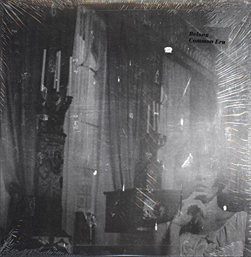 Black and white vinyl record cover with blurry architectural image.