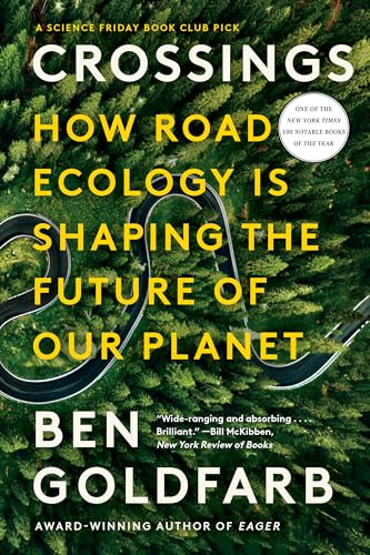 Book cover: "Crossings" with a winding road through a green forest.