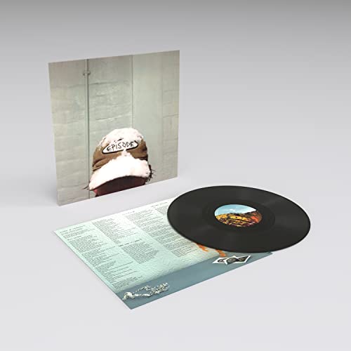 Vinyl record, album cover with a baseball cap, and insert booklet.
