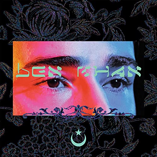 Vinyl album cover featuring a portrait with colorful, floral patterns.