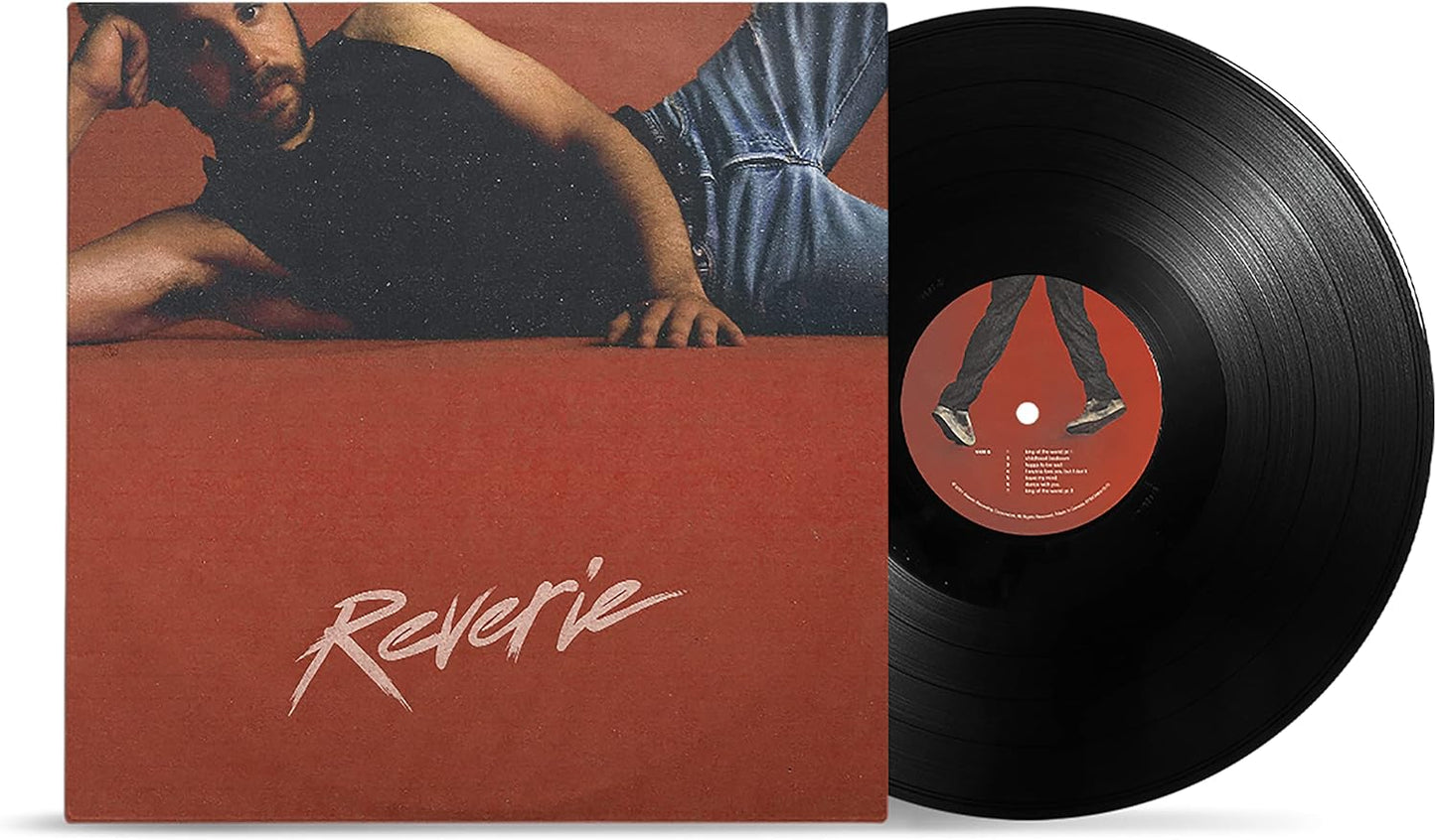 Ben Platt's "Reverie" vinyl record with album cover and black disc.