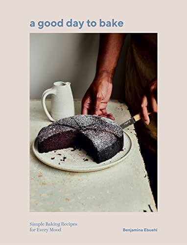 Cookbook cover with a slice of chocolate cake and a hand cutting it.