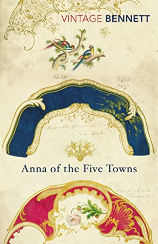 Book cover with ornate gold flourishes, colorful birds, and blue and red decorative elements.