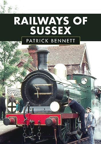 Book cover: vintage steam locomotive at a rural Sussex railway station.