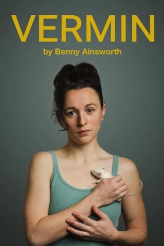 Book cover: woman holding a white rat, dark background, yellow title.