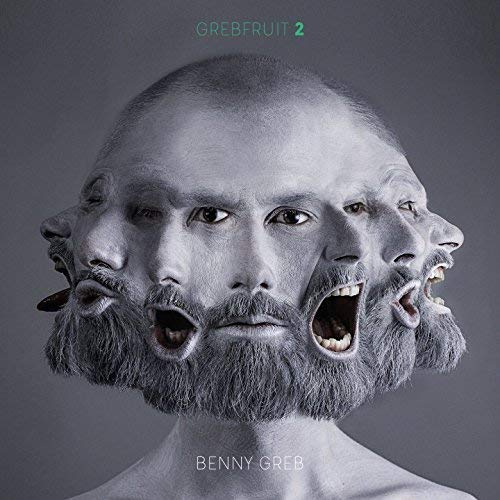 Album cover: multiple faces merging into one, with beard and dark background.