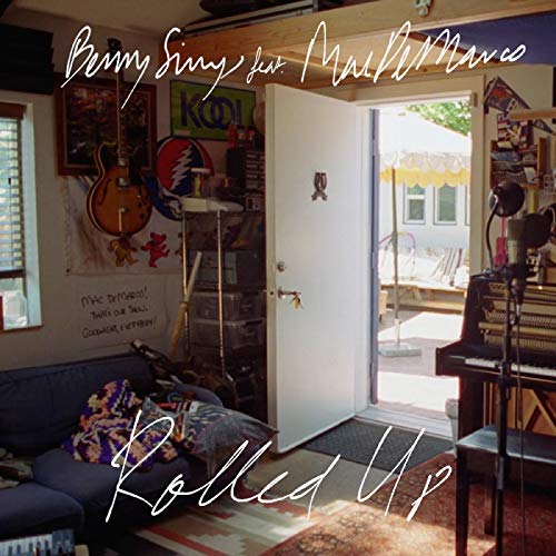 Vinyl record cover featuring a room with an open doorway and musical instruments.