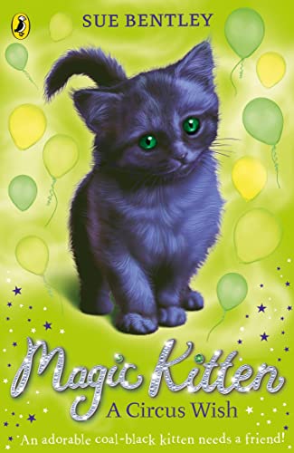 Dark kitten with green eyes sits amidst balloons on a green background.
