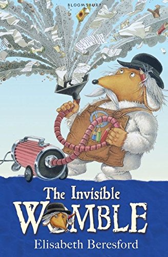 A Womble wearing a bowler hat uses a vacuum cleaner to clear scattered papers.