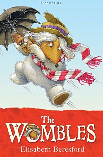 A Womble wearing a hat and scarf runs while holding an umbrella against wind.