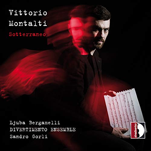 "Man in black holding sheet music, red light effect, on black background, CD cover."