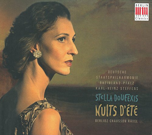 CD cover featuring a woman in a floral top against a landscape background.