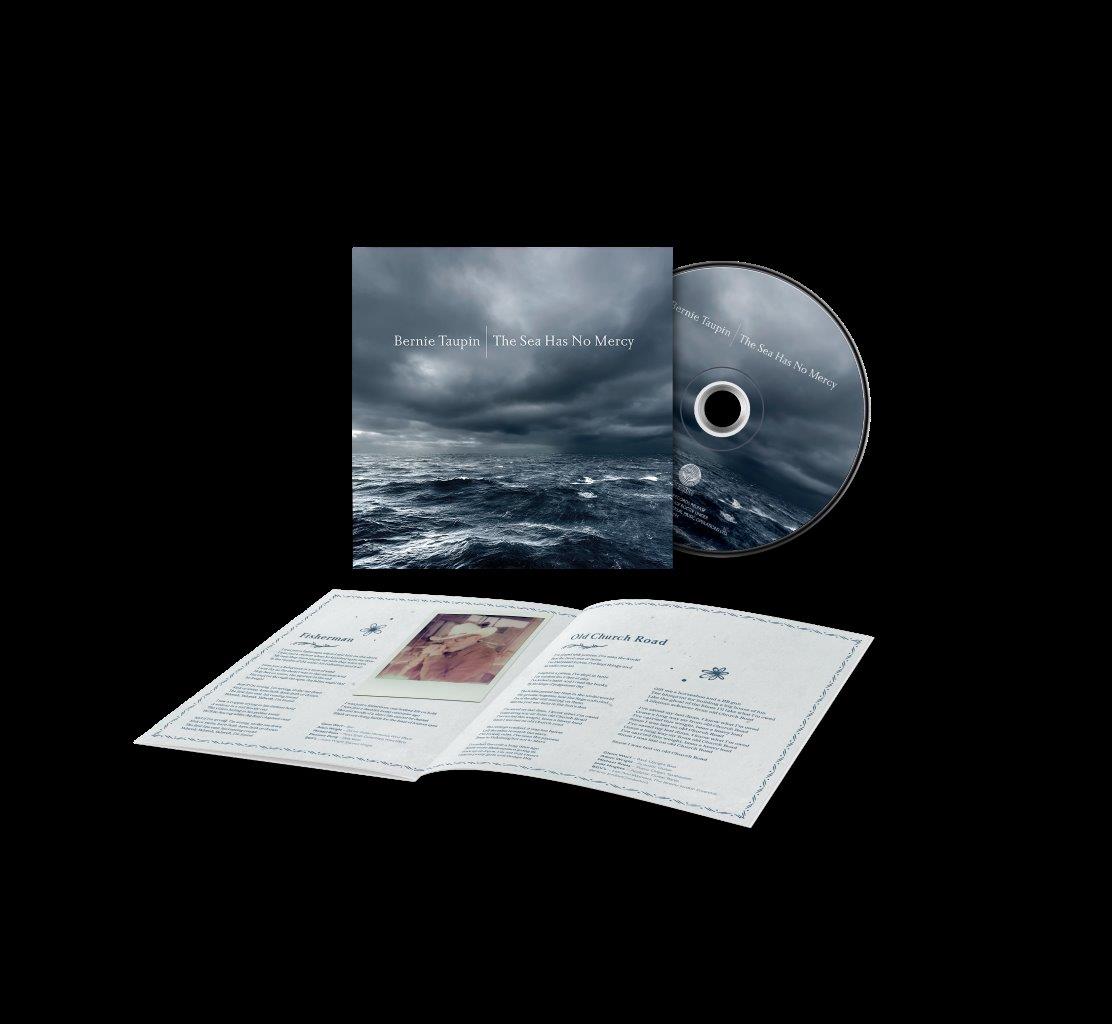 Bernie Taupin CD “The Sea Has No Mercy” with booklet displayed.