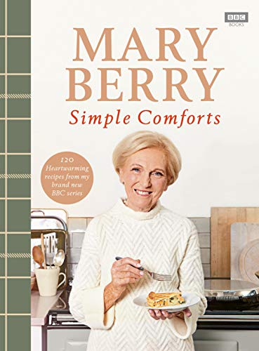 Cookbook cover featuring Mary Berry holding a fork with pastry.