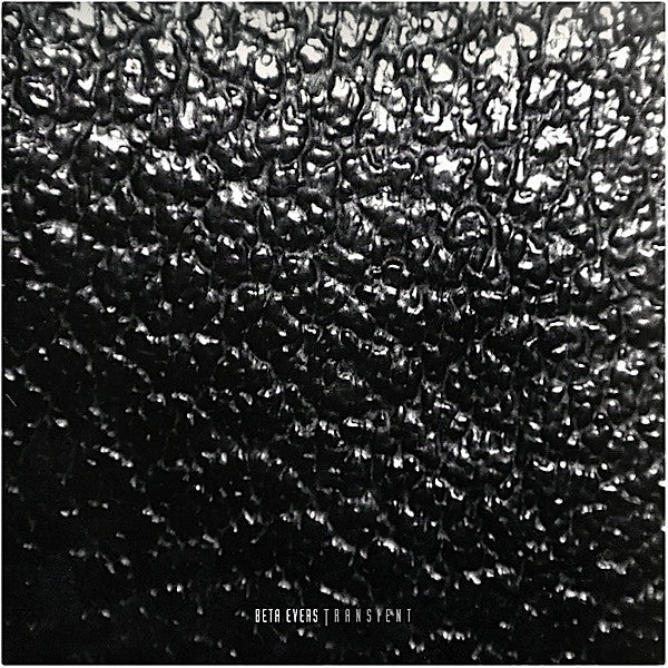 Black and white textured vinyl record cover with "Beta Evers Transient" text.