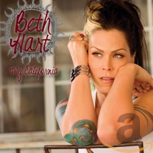 Beth Hart posing with hands near her face, featuring album title text on the left.