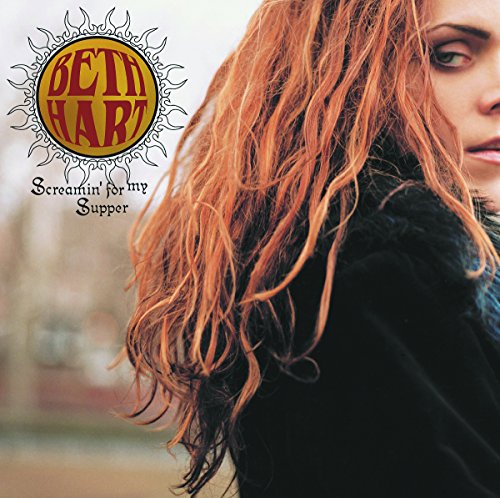 Beth Hart album cover: close-up of a woman with long red hair.