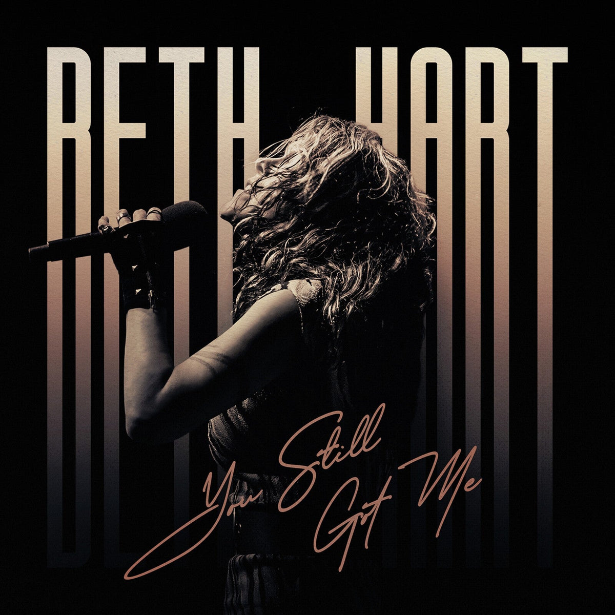 Beth Hart album cover, "You Still Got Me," featuring a singer with a microphone.