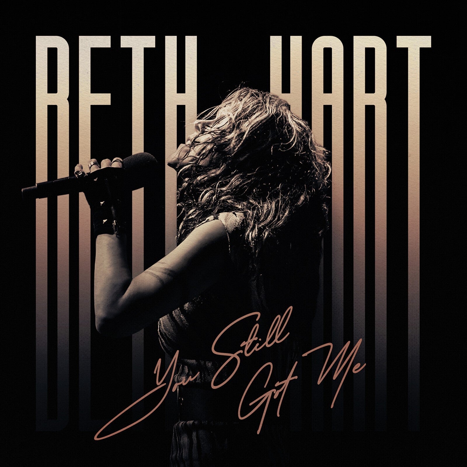 Beth Hart album cover, "You Still Got Me," featuring a singer with a microphone.