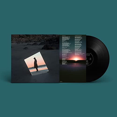 Beth Orton’s “Weather Alive” vinyl record with beach and sunset imagery.