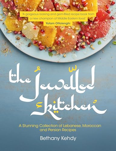 Cookbook cover with citrus fruit, pomegranate, and ornate title: "The Jewelled Kitchen".