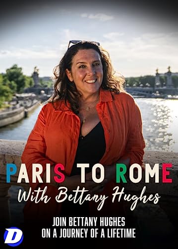 Bettany Hughes smiling, with Paris river and buildings in background.