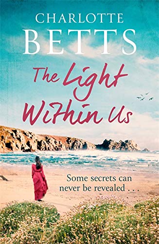 Book cover: woman on beach, coastal landscape, title “The Light Within Us”.