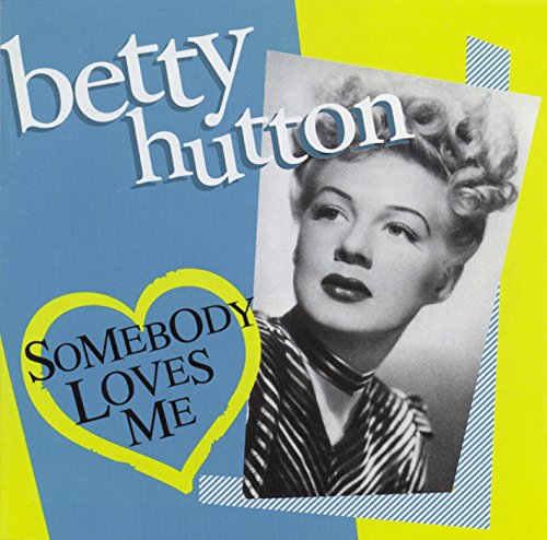 "Album cover with black and white photo of Betty Hutton on blue and yellow background."