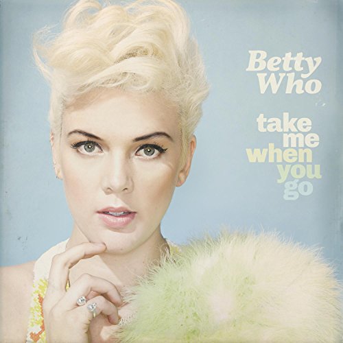 Betty Who album cover: portrait of a blonde woman with fluffy feathers.