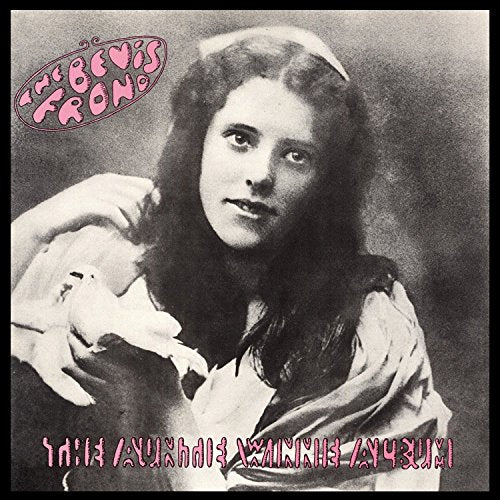 Black and white album cover featuring a woman with long, wavy hair.