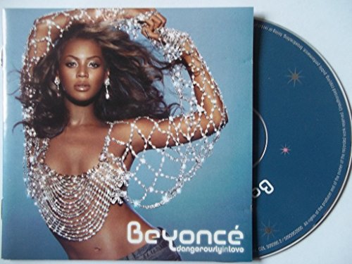 Beyoncé wearing a crystal top on the Dangerously In Love CD cover and disc.