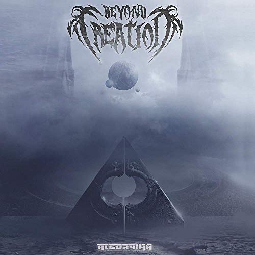 "Album cover with face in sand, glowing eyes, and stylized band and album name text."