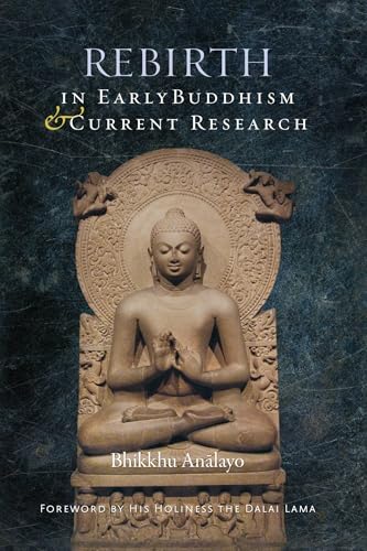 Book cover featuring a stone Buddha statue and the title "Rebirth.