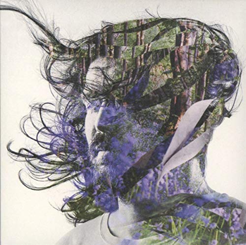 CD cover with a portrait blended into a forest landscape.