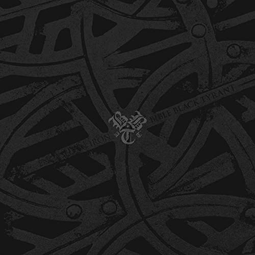Black album cover with intricate, dark geometric patterns and central emblem.