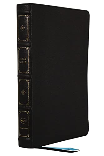 Black leather-bound Bible with gold detailing and a blue ribbon marker.