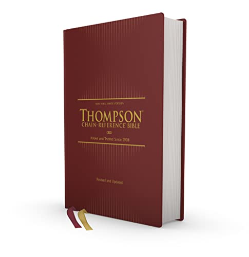 Red hardcover Bible with gold lettering and two ribbon bookmarks.