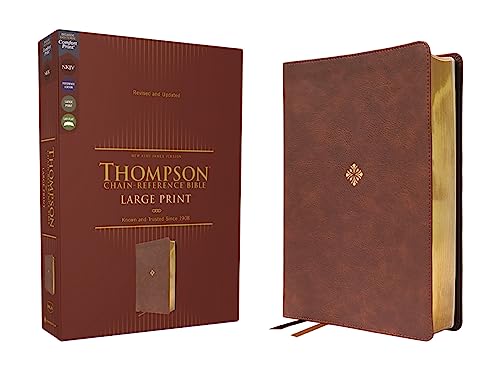 Brown leather-look Bible with gold-edged pages, shown with its box.
